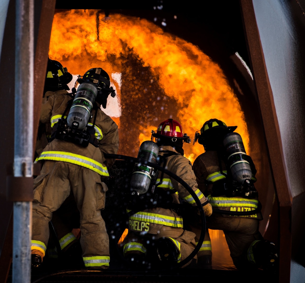 Firefighters from Joint Base San Antonio-Randolph extinguish a fire during training April 11, 2018 at the Camp Talon fire training grounds on JBSA-Randolph. The training takes place quarterly and offers an opportunity for new firefighters to become more confident while fighting fires, but it also gives seasoned Airmen a chance to sharpen their skills and get a head start to the next step in their careers.