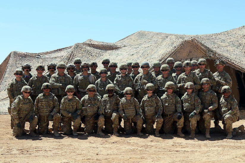 Task Force Spartan Soldiers pose for a group photo in Jordan during their emergency deployment readiness exercise from May 3-10, 2019. During the exercise, Soldiers set up a tactical command post and were able to show their ability to perform command and control from a forward deployed location. As the lead element for Task Force Spartan, the 34th Red Bull Infantry Division works to strengthen partnerships in the region by building upon and leveraging existing relationships.