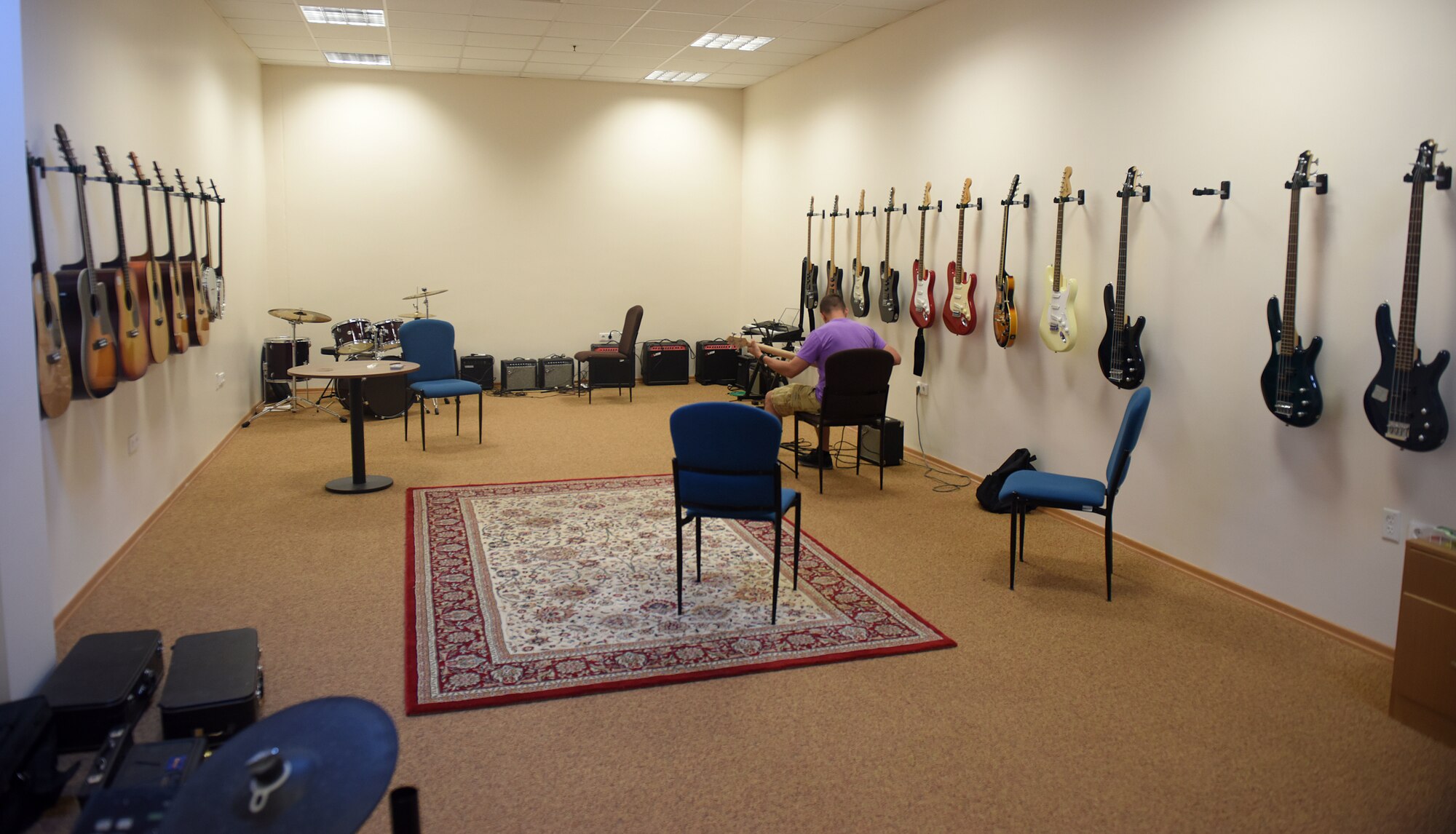 Guitars and other instruments are situated in the Incirlik Community Center music room May 30, 2019, at Incirlik Air Base, Turkey. These instruments are available for Airmen to use for free during their time at Incirlik. (U.S. Air Force photo by Staff Sgt. Trevor Rhynes)