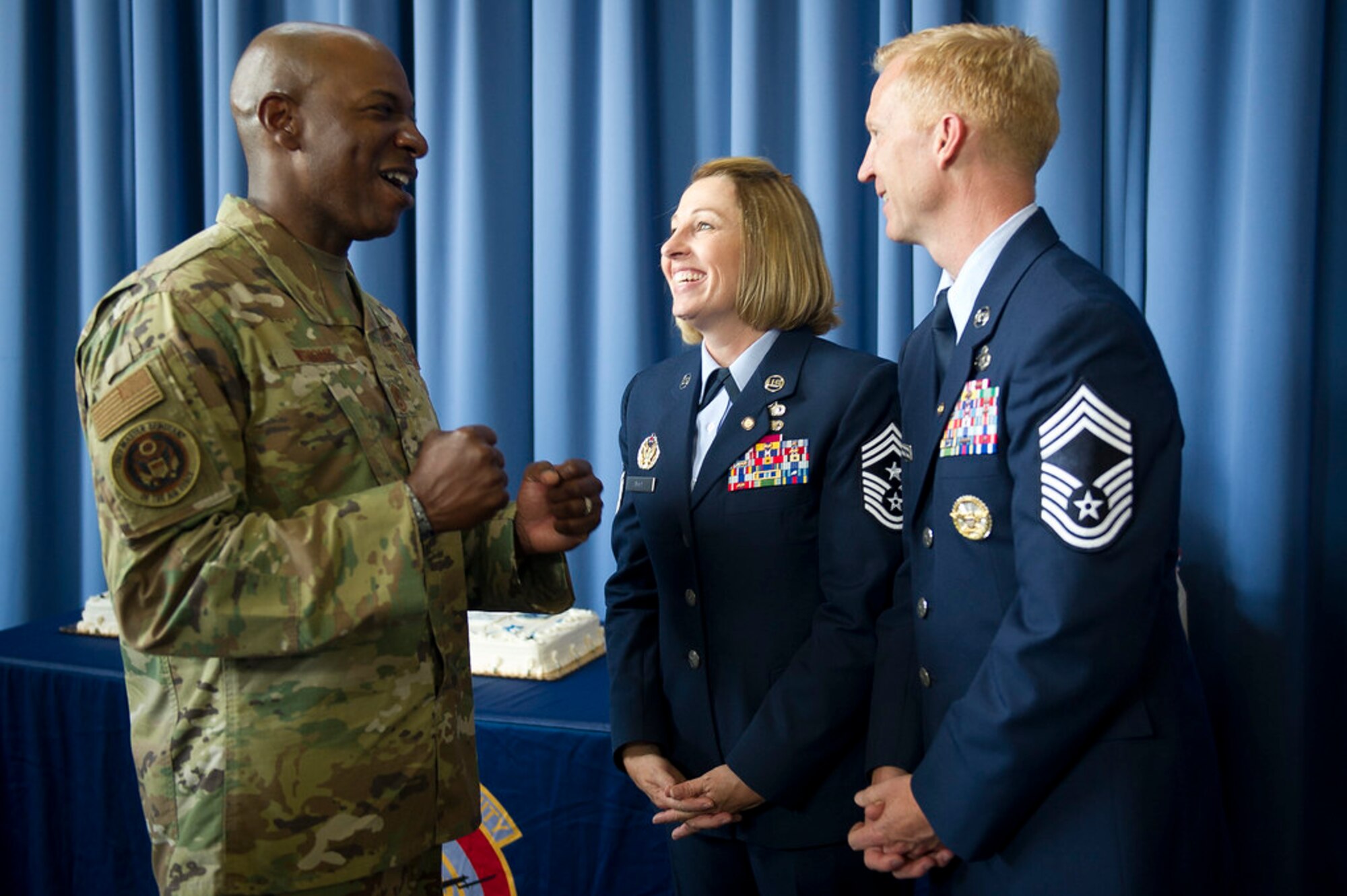 Chief Master Sergeant of the Air Force Kaleth O. Wright, left, congratulates Chief Master Sgts. Melanie K. Noel, Air Force District of Washington command chief, and Michael D. Noel, Senior Enlisted Advisor to the Assistant to the Secretary of Defense for Public Affairs, after their combined retirement ceremony at Joint Base Anacostia-Bolling, Washington, D.C., May 31, 2019. (U.S. Air Force photo by Master Sgt. Michael B. Keller)