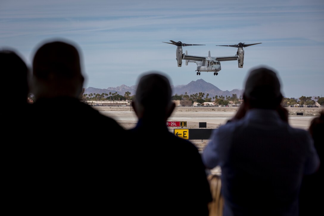 Visitors and spectators view the U.S. Marine Corps MV-22 Osprey as it displays its capabilities during the 2019 Yuma Airhow hosted by Marine Corps Air Station (MCAS) Yuma Ariz., March 9, 2019. The airshow is MCAS Yuma's only military airshow of the year and provides the community an opportunity to see thrilling aerial and ground performers for free while interacting with Marines and Sailors. (U.S. Marine Corps photo by Sgt. Allison Lotz)