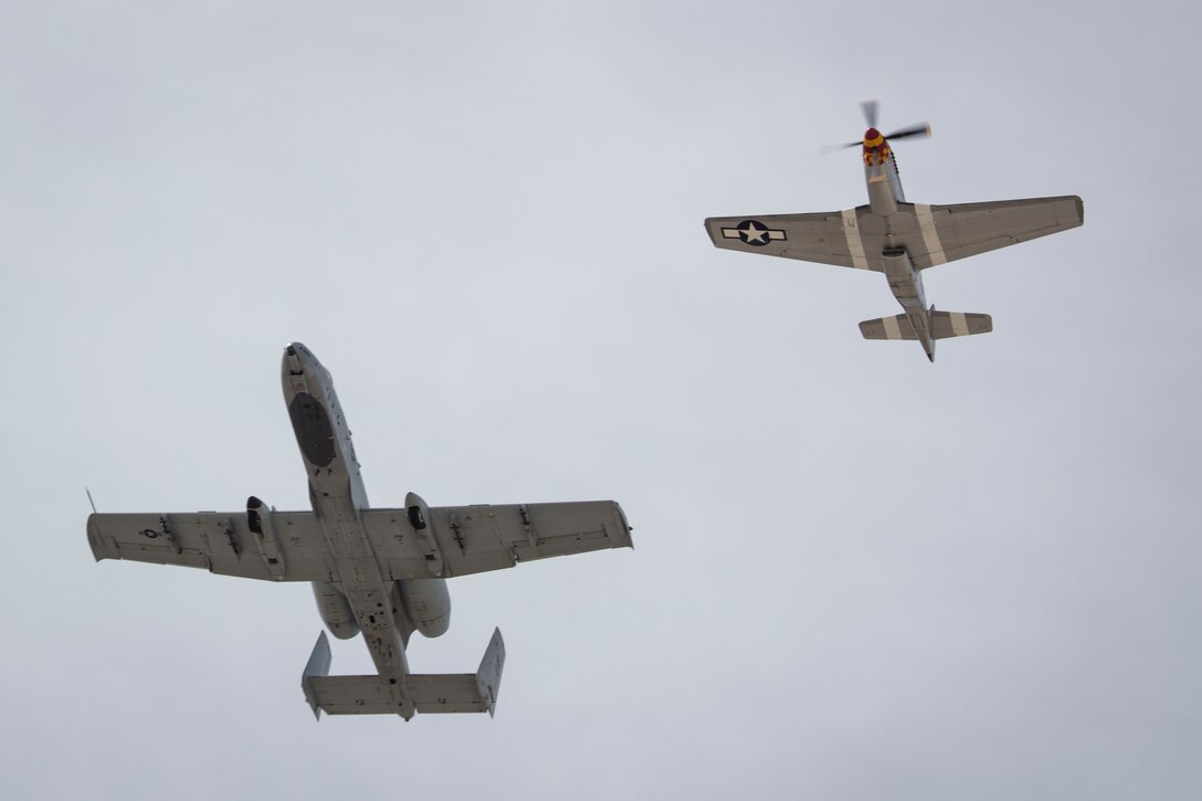The U.S. Air Force A-10 Thunderbolt II and P-51D conduct a heritage flight during the 2019 Yuma Airhow hosted by Marine Corps Air Station (MCAS) Yuma Ariz., March 9, 2019. The airshow is MCAS Yuma's only military airshow of the year and provides the community an opportunity to see thrilling aerial and ground performers for free while interacting with Marines and Sailors. (U.S. Marine Corps photo by Sgt. Allison Lotz)