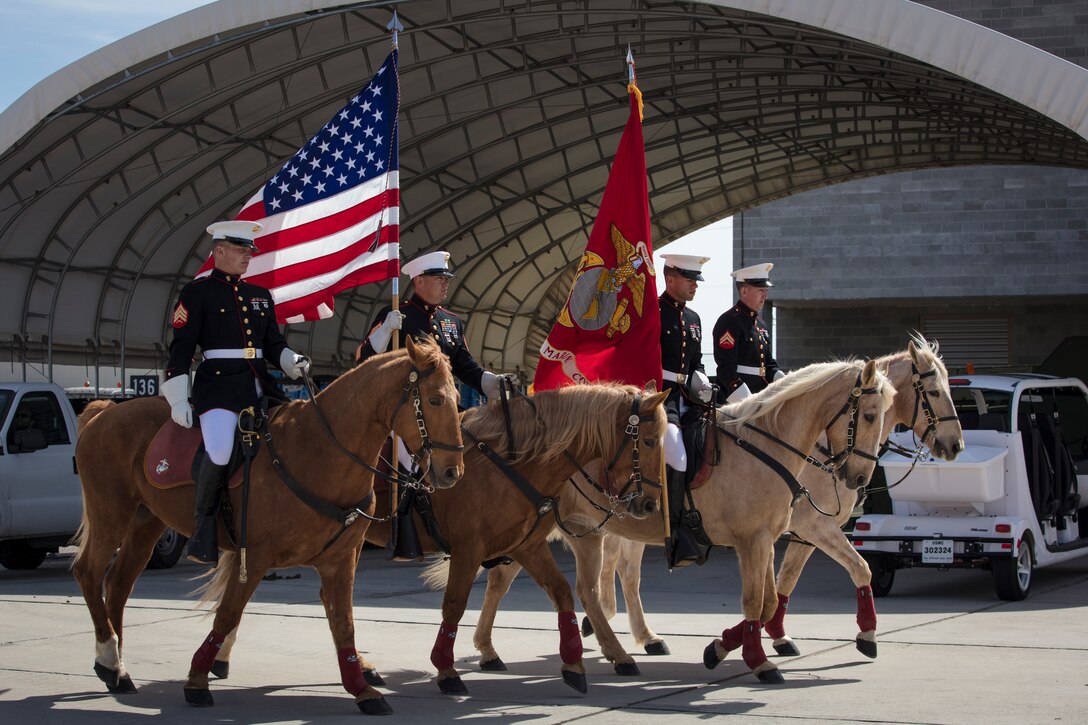 U.S. Marines assigned to the Mounted Color Guard, Marine Corps Base Barstow, Calif., participate in the opening ceremony at the 2019 Yuma Airhow hosted by Marine Corps Air Station (MCAS) Yuma Ariz., March 9, 2019. The airshow is MCAS Yuma's only military airshow of the year and provides the community an opportunity to see thrilling aerial and ground performers for free while interacting with Marines and Sailors. (U.S. Marine Corps photo by Sgt. Allison Lotz)