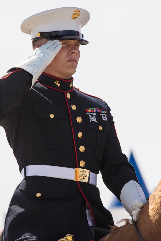 U.S. Marines assigned to the Mounted Color Guard, Marine Corps Base Barstow, Calif., participate in the opening ceremony at the 2019 Yuma Airhow hosted by Marine Corps Air Station (MCAS) Yuma Ariz., March 9, 2019. The airshow is MCAS Yuma's only military airshow of the year and provides the community an opportunity to see thrilling aerial and ground performers for free while interacting with Marines and Sailors. (U.S. Marine Corps photo by Sgt. Allison Lotz)