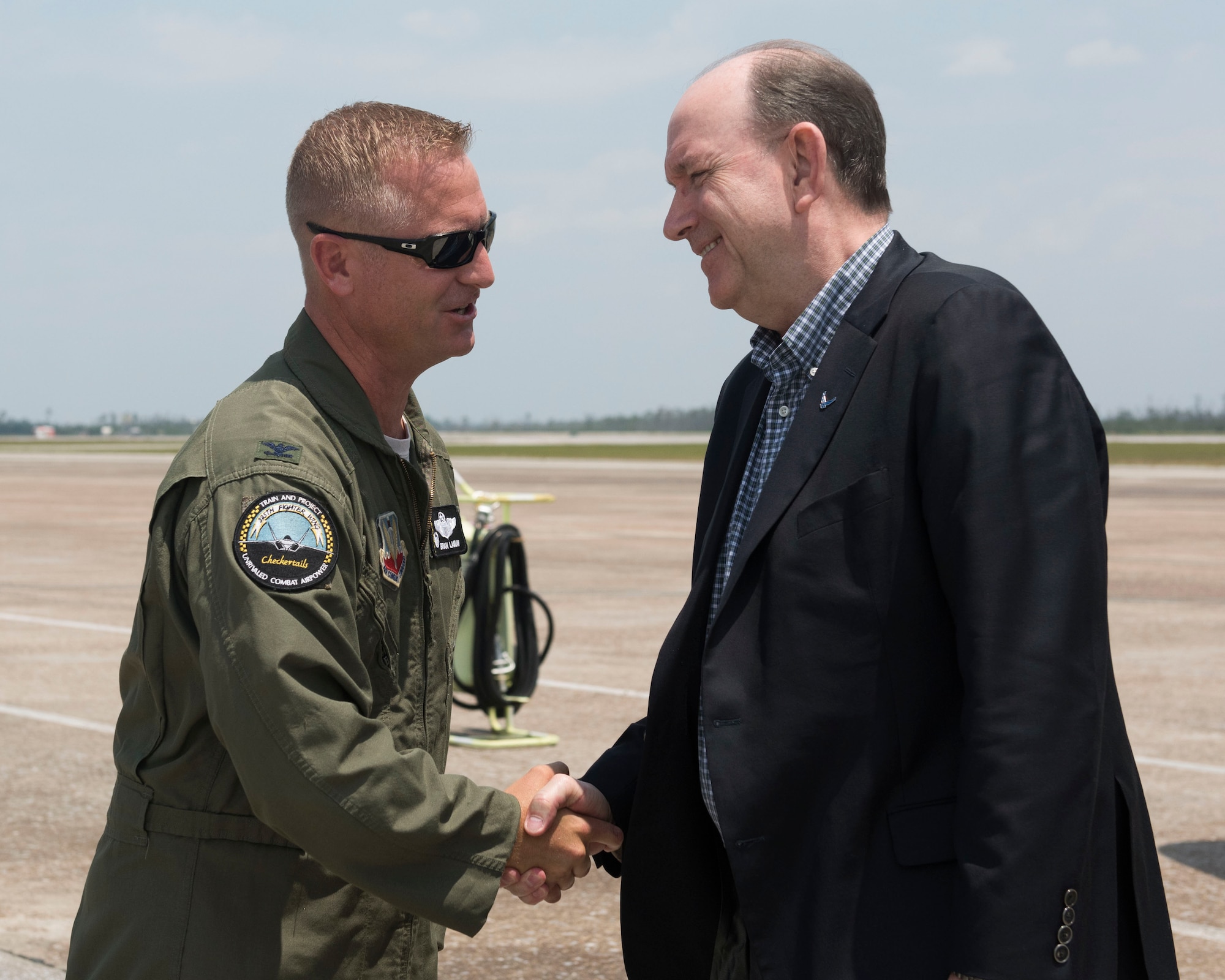 Honorable Matthew P. Donovan, acting Secretary of the Air Force, is greeted by U.S. Air Force Col. Brian Laidlaw, 325th Fighter Wing commander, June 2, 2019, at Tyndall Air Force Base, Florida.