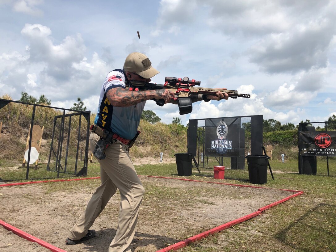 Jeff King, a Naval Surface Warfare Center Panama City Division (NSWC PCD) Diving and Life Support technician is the only civilian member on the five-person United States Navy Marksmanship and Action Shooting Team.  The sport of Multi-Gun requires proficiency in rifle, pistol, and shotgun. Matches are composed of stages in which competitors must neutralize all targets. Stages may include any combination of the three firearms for successful completion.  (Courtesy photo)