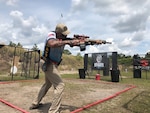 Jeff King, a Naval Surface Warfare Center Panama City Division (NSWC PCD) Diving and Life Support technician is the only civilian member on the five-person United States Navy Marksmanship and Action Shooting Team.  The sport of Multi-Gun requires proficiency in rifle, pistol, and shotgun. Matches are composed of stages in which competitors must neutralize all targets. Stages may include any combination of the three firearms for successful completion.  (Courtesy photo)