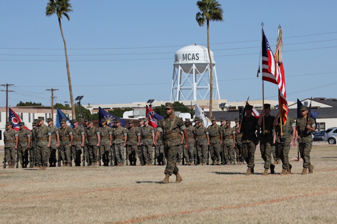 U.S. Marines participate in the Marine Air Control Squadron 1 Relief and Appointment ceremony at Marine Corps Air Station Yuma, Ariz,. March. 13, 2019. The Relief and Appointment ceremony is an honored product of the rich heritage of Naval tradition. The heart of the ceremony is the passing of the organizational NCO Sword by the Activity Commander from the outgoing Sergeant Major to the new Sergeant Major, which signifies the transfer of responsibility, accountability and authority, from one individual to another. (U.S. Marine Corps photo by Lance Cpl. Joel Soriano)