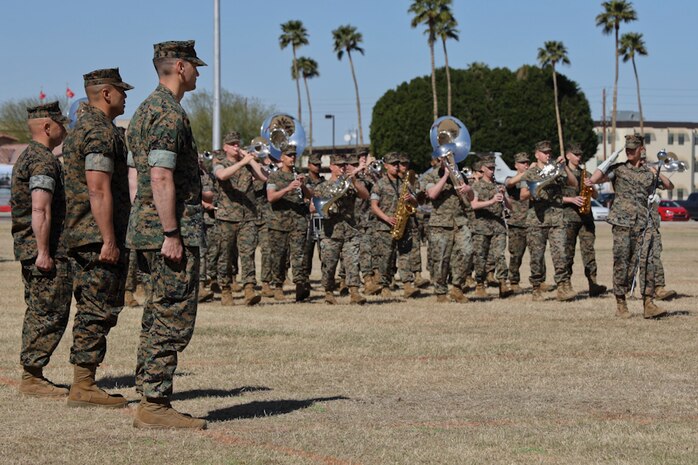 U.S. Marines participate in the Marine Air Control Squadron 1 Relief and Appointment ceremony at Marine Corps Air Station Yuma, Ariz., March 13, 2019. The Relief and Appointment ceremony is an honored product of the rich heritage of Naval tradition. The heart of the ceremony is the passing of the organizational Non-commissioned officer Sword by the Activity Commander from the outgoing Sergeant Major to the new Sergeant Major, which signifies the transfer of responsibility, accountability and authority, from one individual to another. (U.S. Marine Corps photo by Lance Cpl. Joel Soriano)