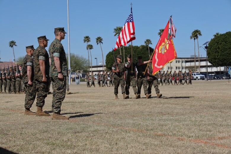 U.S. Marines participate in the Marine Air Control Squadron 1 Relief and Appointment ceremony at Marine Corps Air Station Yuma, Ariz., March 13, 2019. The Relief and Appointment ceremony is an honored product of the rich heritage of Naval tradition. The heart of the ceremony is the passing of the organizational Non-commissioned officer (NCO) Sword by the Activity Commander from the outgoing Sergeant Major to the new Sergeant Major, which signifies the transfer of responsibility, accountability and authority, from one individual to another. (U.S. Marine Corps photo by Lance Cpl. Joel Soriano)