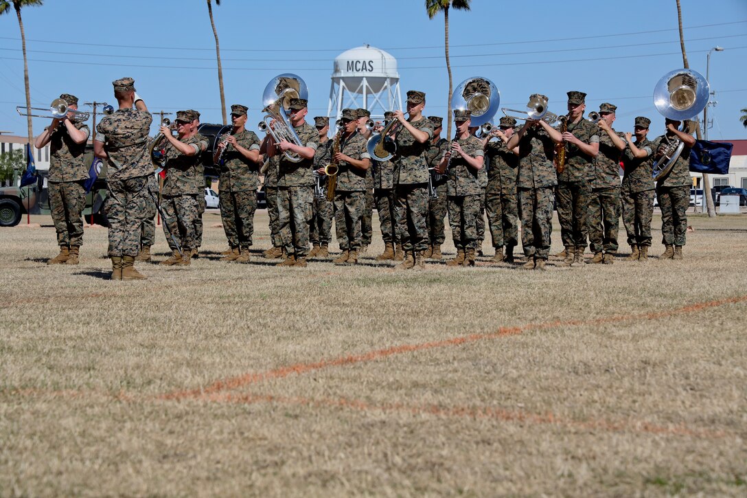 U.S. Marines assigned to the Third Marine Aircraft Wing Band performs during the Marine Air Control Squadron 1 Relief and Appointment Ceremony at Marine Corps Air Station Yuma, Ariz., March. 13, 2019.The Relief and Appointment ceremony is an honored product of the rich heritage of Naval tradition. The heart of the ceremony is the passing of the organizational Non-commissioned officer (NCO) Sword by the Activity Commander from the outgoing Sergeant Major to the new Sergeant Major, which signifies the transfer of responsibility, accountability and authority, from one individual to another. U.S. Marine Corps photo by Lance Cpl. Joel Soriano)