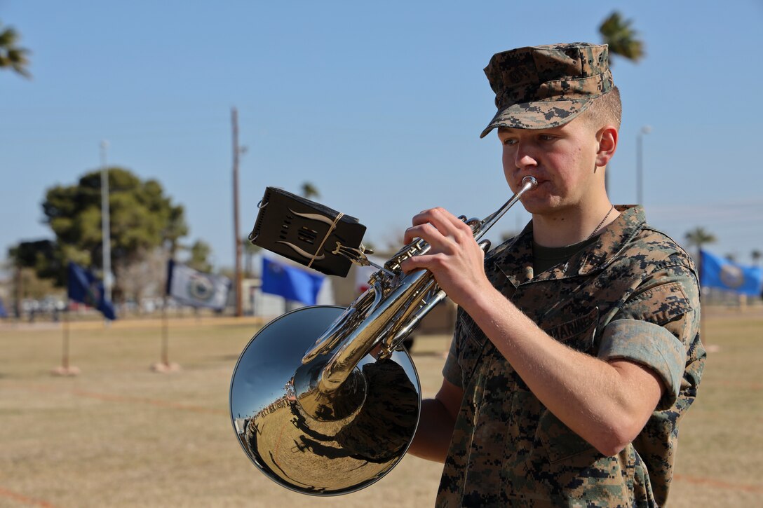 A U.S. Marine assigned to the Third Marine Aircraft Wing Band plays his instrument before the Marine Air Control Squadron 1 Relief and Appointment Ceremony at Marine Corps Air Station Yuma, Ariz., March. 13, 2019.The Relief and Appointment ceremony is an honored product of the rich heritage of Naval tradition. The heart of the ceremony is the passing of the organizational NCO Sword by the Activity Commander from the outgoing Sergeant Major to the new Sergeant Major, which signifies the transfer of responsibility, accountability and authority, from one individual to another. U.S. Marine Corps photo by Lance Cpl. Joel Soriano)