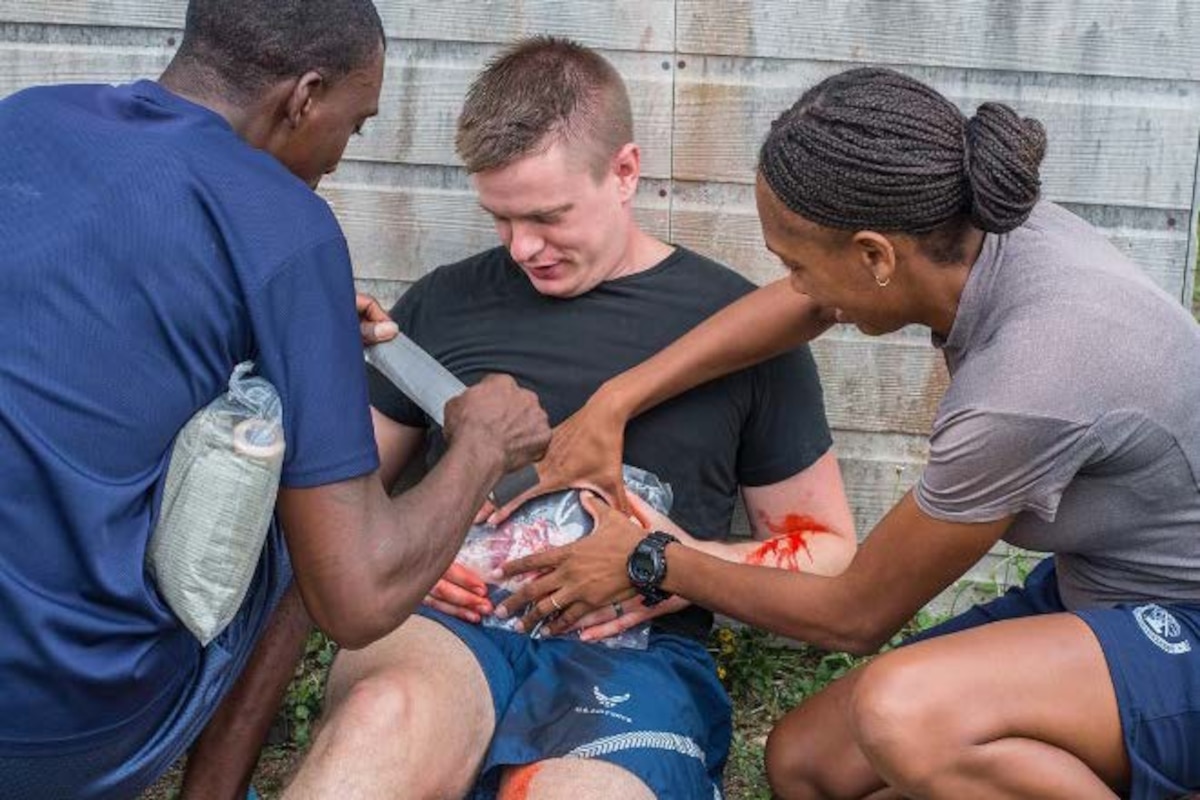 Air Advisors from the 571st Mobility Support Advisory Squadron and partner nation students participate in a medical exercise using moulaged patients during a mobile training team mission in Belize. The 571st MSAS conducted a first-ever air, land and sea training mission with the Belize Air Wing, Belize Defence Force, and Belize Coast Guard from May 3 -18. (Courtesy photo)