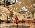 Navy Lt.j.g. Grant Vemeer, from Mountain View, Cali., performs a jump shot to score during a game against the U.S. Marine Corps basketball team. Elite U.S. military basketball players from around the world compete for dominance at Naval Station Mayport during the 2019 Armed Forces Men's and Women's Basketball Championship. Army, Marine Corps, Navy (with Coast Guard) and Air Force teams square off at the annual event which features double round-robin action, followed by championship and consolation games to crown the best players in the military. (U.S. Navy photo by Mass Communication Specialist 1st Class Gulianna Dunn/RELEASED). 190602-N-RE636-0372.JPG