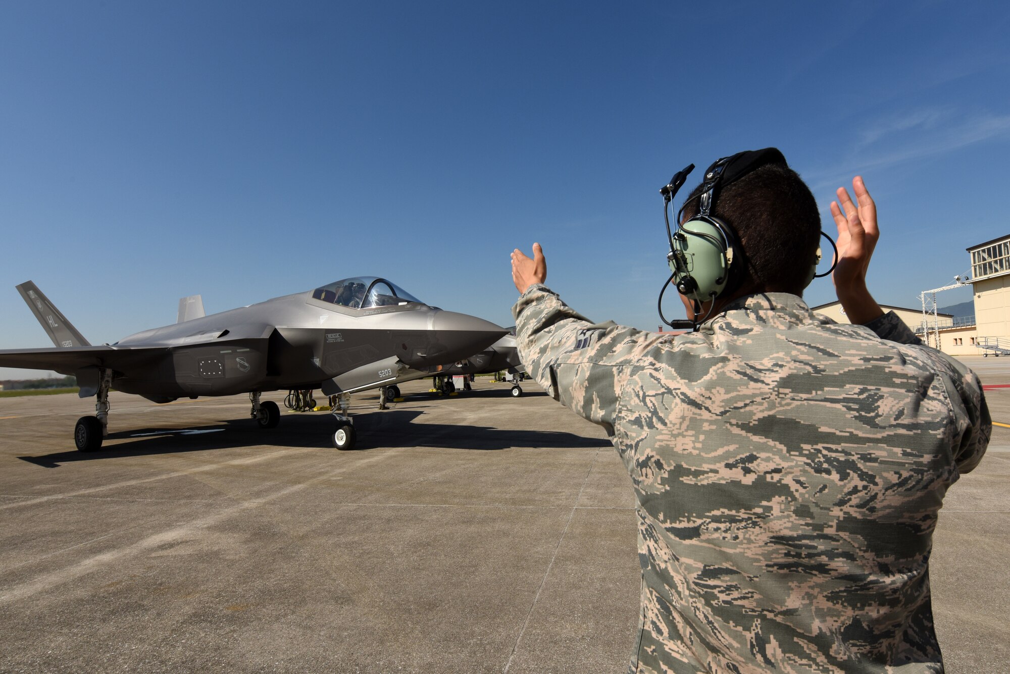 Airman 1st Class Zachary Stiles, 421st Aircraft Maintenance Unit BOLT mission systems technician, taxis an F-35A Lightning II fighter jet May 31, 2019, at Aviano Air Base. Airmen from the 388th and 419th Fighter Wings at Hill Air Force Base, Utah, are in Europe as part of a Theater Security Package. Currently they are participating in Astral Knight 2019, a joint and multinational exercise that involves airmen, soldiers and sailors from the United States and airmen from Croatia, Italy, and Slovenia. The exercise is an integrated air and missile defense exercise focused on conducting integrated defense of key terrain. (U.S. Air Force photo by Tech. Sgt. Jim Araos) (U.S. Air Force photo by Tech. Sgt. Jim Araos)