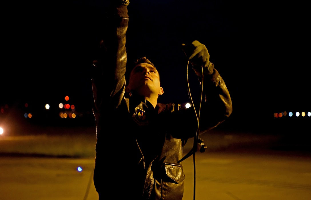 U.S. Air Force Capt. Vincent Pellegri, 351st Air Refueling Squadron aircraft commander, performs pre-flight checks during exercise Astral Knight at RAF Mildenhall, England, June 3, 2019. AK19 is a joint, multinational exercise designed to test Integrated Air and Missile Defense capabilities and will involve a combination of flight operations and computer-assisted exercise scenarios. Participants include the U.S. Air Forces in Europe, U.S. Army Europe forces, and members from the Italian and Croatian air forces. (U.S. Air Force photo by Airman 1st Class Brandon Esau)