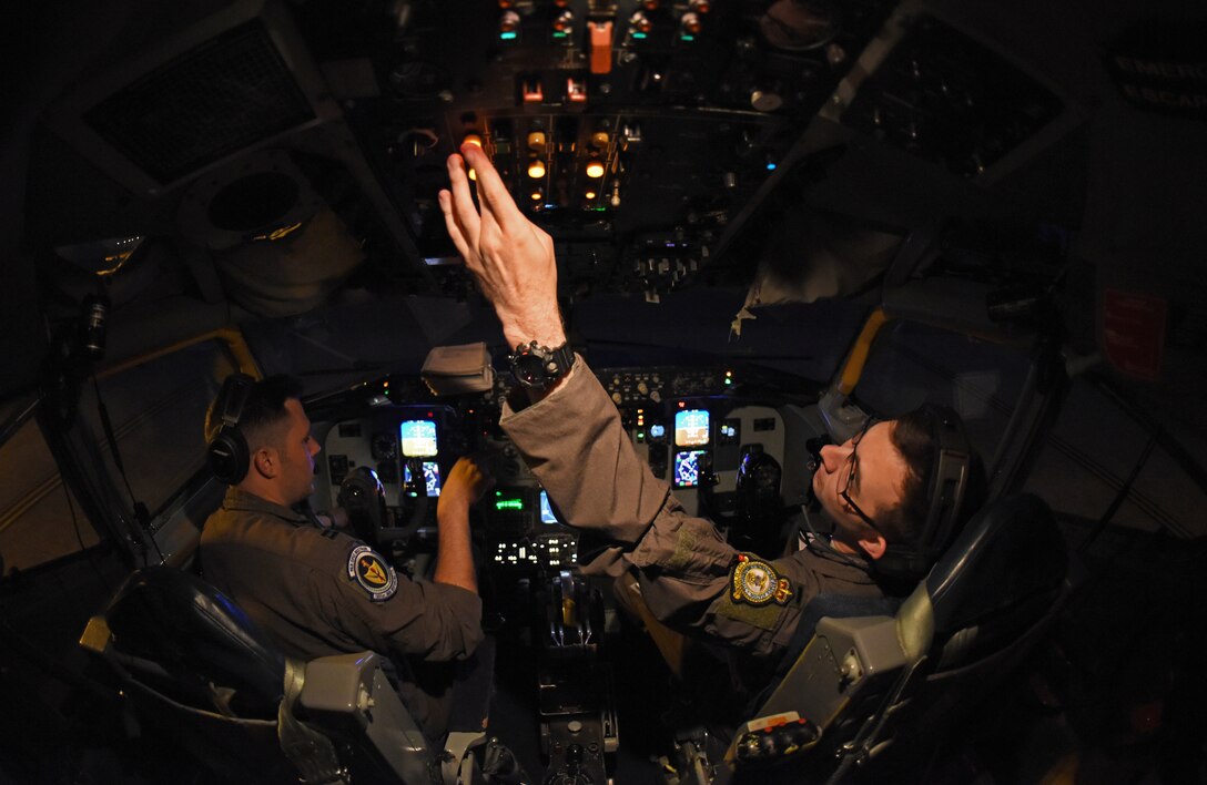 U.S. Air Force 1st Lt. James Herbert, 351st Air Refueling Squadron, performs pre-flight checks during exercise Astral Knight at RAF Mildenhall, England, June 3, 2019. AK19 is a joint, multinational exercise which aims to demonstrate the integration, coordination, and interoperability of joint existing command and control at the operation and tactical levels. (U.S. Air Force photo by Airman 1st Class Brandon Esau)