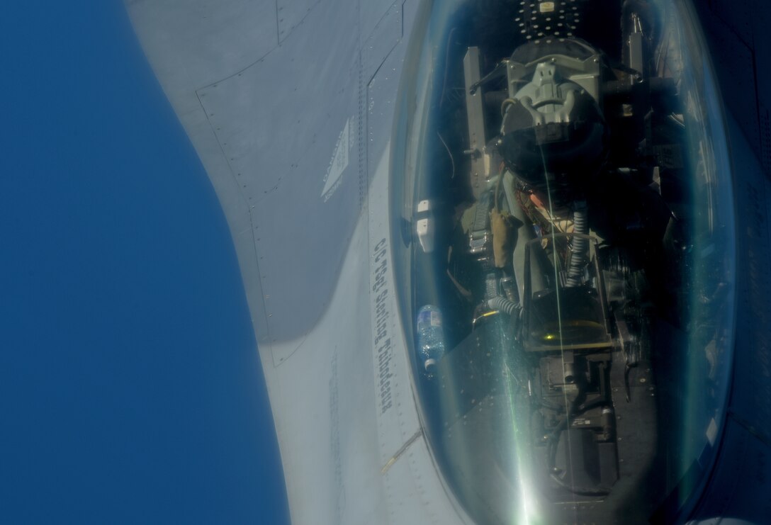 A U.S. Air Force F-16 Fighting Falcon from the 457th Fighter Squadron, Fort Worth, Texas, prepares to receive fuel from a 100th Air Refueling Wing KC-135 Stratotanker from RAF Mildenhall, England, during exercise Astral Knight over the skies of Italy, June 3, 2019. AK19 is a joint, multinational exercise designed to test Integrated Air and Missile Defense capabilities and will involve a combination of flight operations and computer-assisted exercise scenarios. Participants include the U.S. Air Forces in Europe, U.S. Army Europe forces, and members from the Italian and Croatian air forces. (U.S. Air Force photo by Airman 1st Class Brandon Esau)