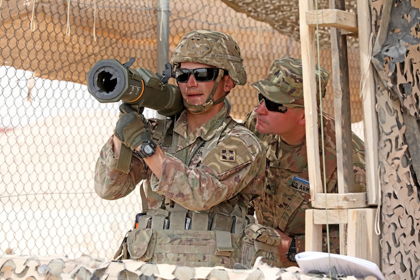 Sgt. Jared Beall, an infantry Soldier with 1st Battalion, 68th Armor Regiment, 3rd Armored Brigade Combat Team, 4th Infantry Division, undergoes evaluation on the M136 AT4 anti-tank weapon during testing for the Expert Infantryman Badge at Camp Buehring, Kuwait on Wednesday, May 29, 2019. During weapons, medical, and patrol lanes, Soldiers tested at 10 stations each day, demonstrating expertise in a variety of skills and tasks.