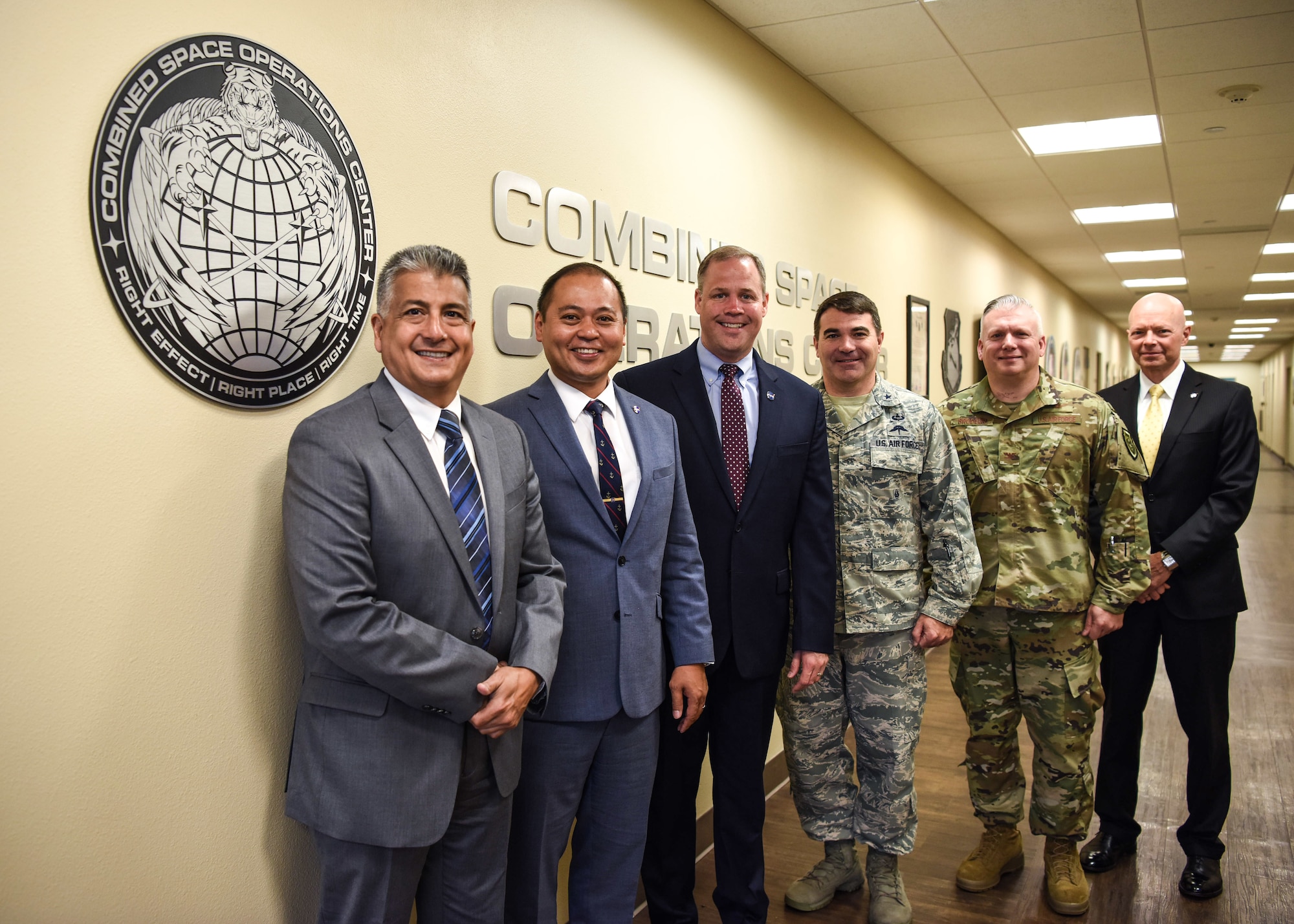 Jim Bridenstine, NASA administrator and Brig. Gen. Matthew Davidson, 14th Air Force vice commander, pose for a photo with senior space officials at the Combined Space Operations Center during a visit June 3, 2019, at Vandenberg Air Force Base, Calif.  During the visit Bridenstine met with officials from the CSpOC, 18th Space Control Squadron, Commercial Integration Cell, Joint Force Space Component Command and SpaceX to discuss space operations and support. The CSpOC actively supports human space flight operations and safety for NASA and astronauts aboard the International Space Station. (U.S. Air Force photo by Airman 1st Class Aubree Milks)