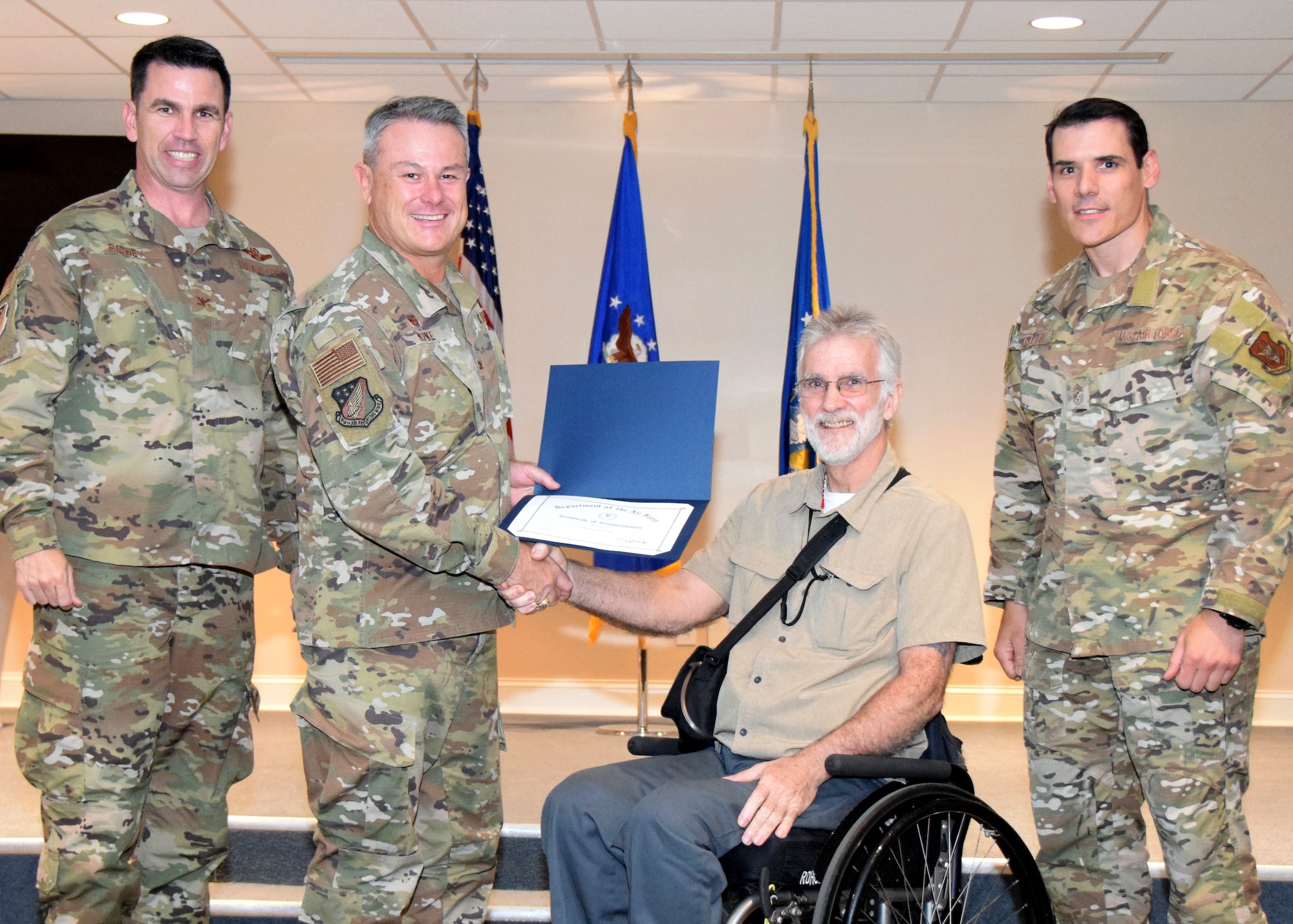 May was recognized in a special ceremony with other members of the wing with over 20 years of service.