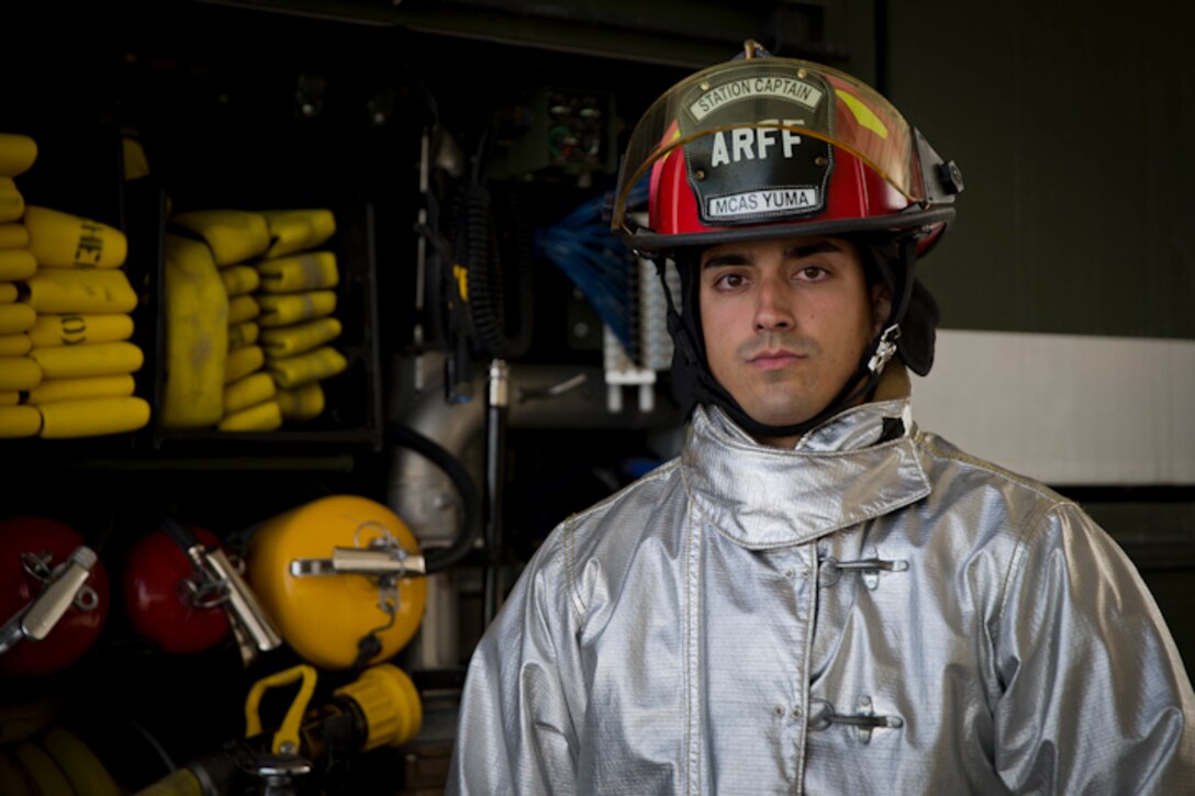 U.S. Marine Corps Sgt. Jose Toledo, an Aircraft Rescue and Firefighting Specialist with Headquarters & Headquarters Squadron, poses for a photograph at Marine Corps Air Station Yuma Ariz., March 27, 2019. Sgt. Toledo is the 2018 Marine Corps Military Firefighter of the Year. (U.S. Marine Corps photo by Lance Cpl. Joel Soriano)
