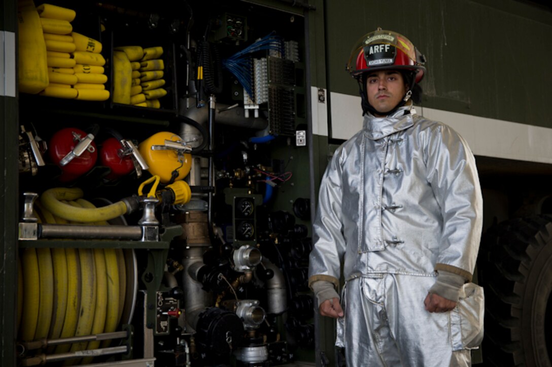 U.S. Marine Corps Sgt. Jose Toledo, an Aircraft Rescue and Firefighting Specialist with Headquarters & Headquarters Squadron, poses for a photograph at Marine Corps Air Station Yuma Ariz., March 27, 2019. Sgt. Toledo is the 2018 Marine Corps Military Firefighter of the Year. (U.S. Marine Corps photo by Lance Cpl. Joel Soriano)