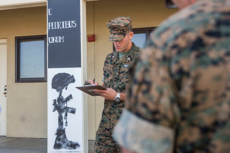 U.S. Marines assigned to Headquarters & Headquarters Squadron (H&HS) participate in a barracks deck competition at the Marine Corps Air Station (MCAS) Yuma H&HS Barracks, March 28, 2019. The Marines had 72 hours to paint and design their deck how they pleased, with rules and guidelines to adhere to. Third deck won the competition with a theme of "Operation Enduring Freedom". (U.S. Marine Corps photo by Cpl. Sabrina Candiaflores)