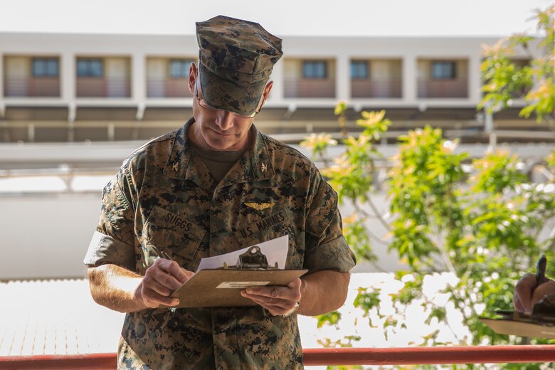 U.S. Marines assigned to Headquarters & Headquarters Squadron (H&HS) participate in a barracks deck competition at the Marine Corps Air Station (MCAS) Yuma H&HS Barracks, March 28, 2019. The Marines had 72 hours to paint and design their deck how they pleased, with rules and guidelines to adhere to. Third deck won the competition with a theme of "Operation Enduring Freedom". (U.S. Marine Corps photo by Cpl. Sabrina Candiaflores)
