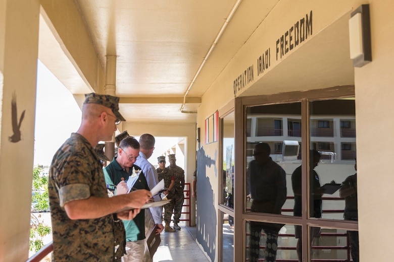 U.S. Marines assigned to Headquarters & Headquarters Squadron (H&HS) participate in a barracks deck competition at the Marine Corps Air Station (MCAS) Yuma H&HS Barracks, March 28, 2019. The Marines had 72 hours to paint and design their deck how they pleased, with rules and guidelines to adhere to. Third deck won the competition with a theme of "Operation Enduring Freedom". (U.S. Marine Corps photo by Cpl. Sabrina Candiaflores)