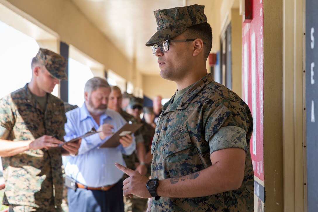 U.S. Marines assigned to Headquarters & Headquarters Squadron (H&HS) participate in a barracks deck competition at the Marine Corps Air Station (MCAS) Yuma H&HS Barracks, March 28, 2019. The Marines had 72 hours to paint and design their deck how they pleased, with rules and guidelines to adhere to. Third deck won the competition with a theme of "Operation Enduring Freedom". (U.S. Marine Corps photo by Cpl. Sabrina Candiaflores)