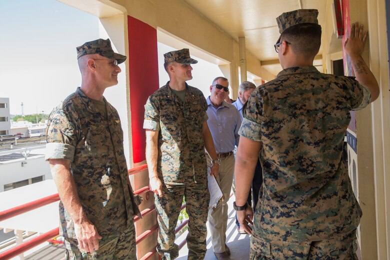 U.S. Marines assigned to Headquarters & Headquarters Squadron (H&HS) participate in a barracks deck competition at the Marine Corps Air Station (MCAS) Yuma H&HS Barracks, March 28, 2019. The Marines had 72 hours to paint and design their deck how they pleased, with rules and guidelines to adhere to. Third deck won the competition with a theme of "Operation Enduring Freedom". (U.S. Marine Corps photo by Cpl. Sabrina Candiaflores)