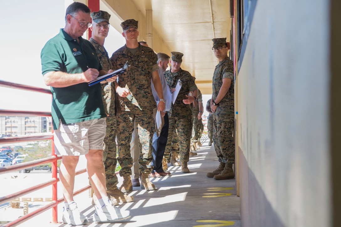 U.S. Marines assigned to Headquarters & Headquarters Squadron (H&HS) participate in a barracks deck competition at the Marine Corps Air Station (MCAS) Yuma H&HS Barracks, March 28, 2019. The Marines had 72 hours to paint and design their deck how they pleased, with rules and guidelines to adhere to. Third deck won the competition with a theme of "Operation Enduring Freedom". (U.S. Marine Corps photo by Cpl. Sabrina Candiaflores)