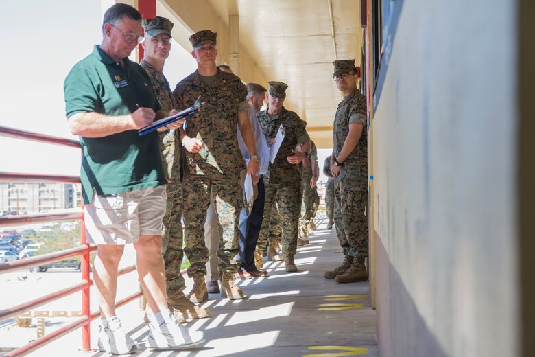 U.S. Marines assigned to Headquarters & Headquarters Squadron (H&HS) participate in a barracks deck competition at the Marine Corps Air Station (MCAS) Yuma H&HS Barracks, March 28, 2019. The Marines had 72 hours to paint and design their deck how they pleased, with rules and guidelines to adhere to. Third deck won the competition with a theme of "Operation Enduring Freedom". (U.S. Marine Corps photo by Cpl. Sabrina Candiaflores)