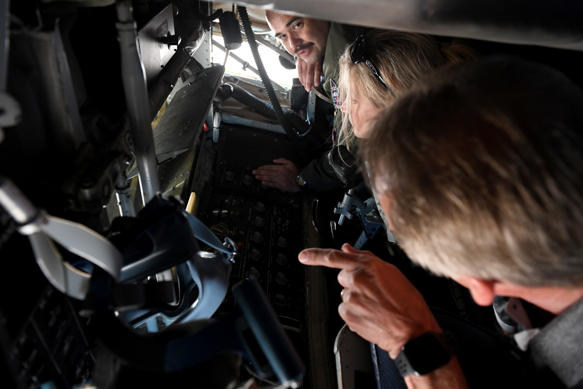 Tech. Sgt. Ezekiel Brito, 54th Air Refueling Squadron boom operator, shows honorary commanders the boom pod on the KC-135 Stratotanker, May 31, 2019, at Altus Air Force Base, Okla. The honorary commanders were given the opportunity to visit all three major weapons systems at the base during the Honorary Commanders Boot Camp. (U.S. Air Force Photo by Senior Airman Jackson N. Haddon)