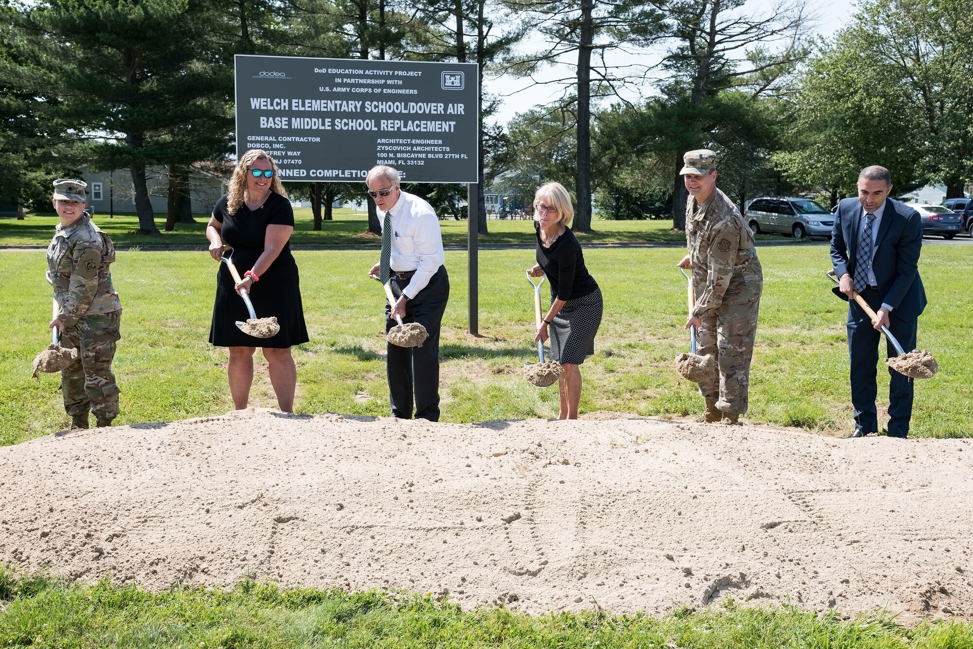 Pictured from the left, Lt. Col. Kristen Dahle, U.S. Army Corps of Engineers Philadelphia District commander; Jessica Marelli, Caesar Rodney School District Board of Education president, Camden, Del.; Sen. Tom Carper, D-Del.; Kate Rohrer, Kent and Sussex counties, Delaware director for Sen. Chris Coons, D-Del.; Col. Joel Safranek, 436th Airlift Wing commander; and Hossam Ibrahim, Dobco, Inc. vice president, break ground for the new Welch Elementary School/Dover Air Base Middle School June 3, 2019, in the family housing area at Dover Air Force Base, Del. The $48 million project, federally funded by the Department of Defense Education Activity, will be built on the football field across the street from the Youth Center and adjacent to the existing elementary and middle schools. Scheduled to open at the beginning of the 2021 school year, the new building will have over 105,000 square feet of learning space for approximately 490 students. (U.S. Air Force photo by Roland Balik)