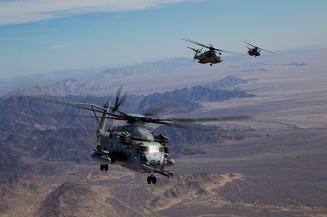 U.S. Marines with Marine Aerial Refuel Squadron VMGR-252 conduct an aerial refuel for a CH-53 in support of Weapons and Tactics Instructor (WTI) course 2-19 in Yuma, Ariz., April 6, 2019. WTI is a seven-week training event which emphasizes operational integration of the six functions of the Marine Corps aviation in support of a Marine Air Ground Task Force. WTI also provides standardized advanced tactical training and certification of unit instructor qualifications to support Marine aviation training readiness and assists in developing and employing aviation weapons and tactics. (U.S. Marine Corps photo by Pfc John Hall)