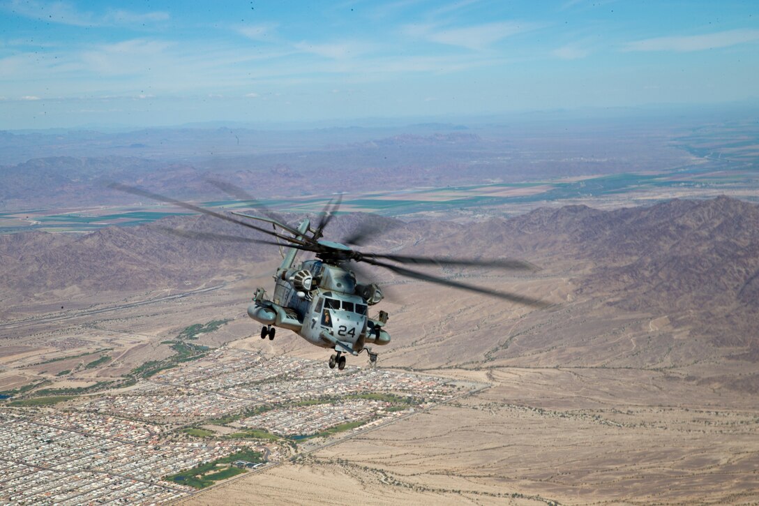 U.S. Marines with Marine Aerial Refuel Squadron VMGR-252 conduct an aerial refuel for a CH-53 in support of Weapons and Tactics Instructor (WTI) course 2-19 in Yuma, Ariz., April 6, 2019. WTI is a seven-week training event which emphasizes operational integration of the six functions of the Marine Corps aviation in support of a Marine Air Ground Task Force. WTI also provides standardized advanced tactical training and certification of unit instructor qualifications to support Marine aviation training readiness and assists in developing and employing aviation weapons and tactics. (U.S. Marine Corps photo by Pfc John Hall)