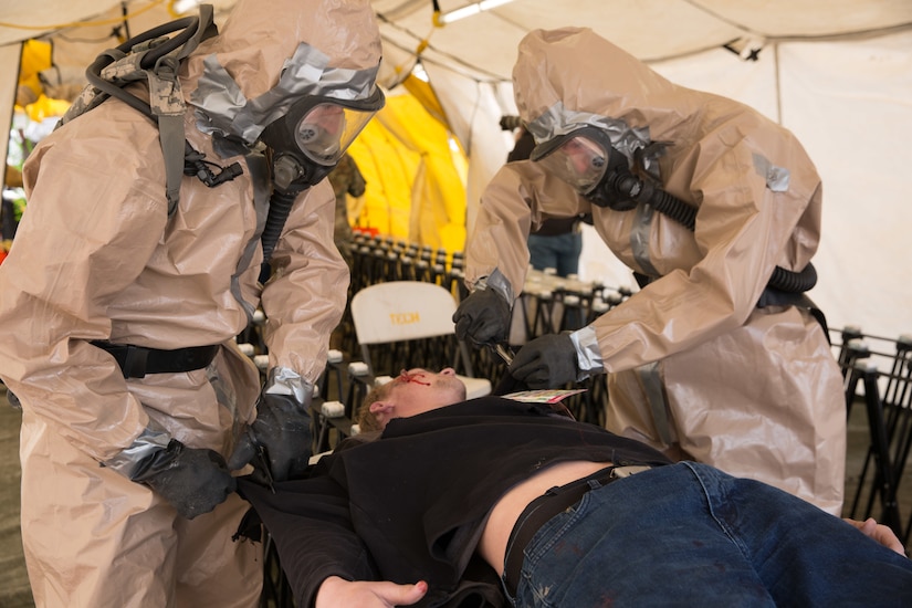 Members of the Utah National Guard provide assistance following a nuclear fallout scenario exercise at Camp Williams in Bluffdale to showcase the Homeland Response Force’s capabilities on Saturday, March 23, 2019. The training involved drills on on responding to a 10-kiloton nuclear blast and included rescue, extraction, decontamination and medical attention.