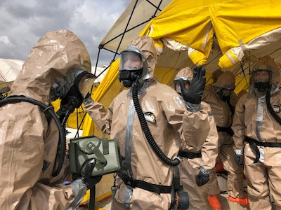 Members of the Utah National Guard provide assistance following a nuclear fallout scenario exercise at Camp Williams in Bluffdale to showcase the Homeland Response Force’s capabilities on Saturday, March 23, 2019. The training involved drills on on responding to a 10-kiloton nuclear blast and included rescue, extraction, decontamination and medical attention.