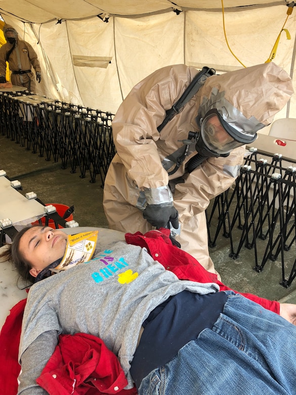 Members of the Utah National Guard provide assistance following a nuclear fallout scenario exercise at Camp Williams in Bluffdale to showcase the Homeland Response Force’s capabilities on Saturday, March 23, 2019. The training involved drills on on responding to a 10-kiloton nuclear blast and included rescue, extraction, decontamination and medical attention.