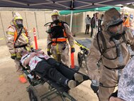 Members of the Utah National Guard provide assistance following a nuclear fallout scenario exercise at Camp Williams in Bluffdale to showcase the Homeland Response Force’s capabilities on Saturday, March 23, 2019. The training involved drills on on responding to a 10-kiloton nuclear blast and included rescue, extraction, decontamination and medical attention.