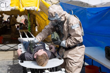 Members of the Utah National Guard provide assistance following a nuclear fallout scenario exercise at Camp Williams in Bluffdale to showcase the Homeland Response Force’s capabilities on Saturday, March 23, 2019. The training involved drills on on responding to a 10-kiloton nuclear blast and included rescue, extraction, decontamination and medical attention.