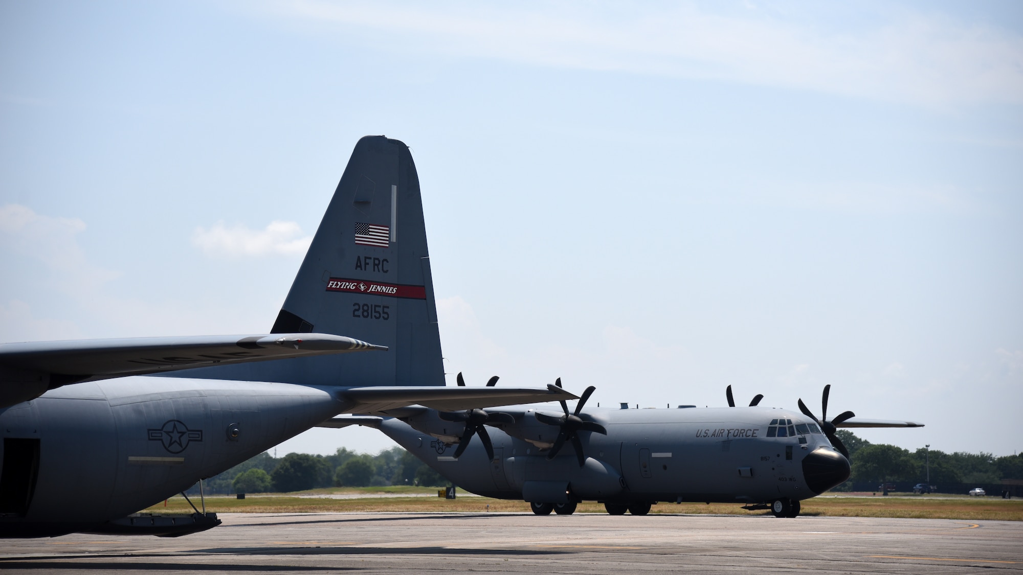 A C-130J Super Hercules from the 815th Airlift Squadron,  taxis toward its parking spot June 4, 2019 at Keesler Air Force Base, Miss. Lt. Col. Keith Gibson, 403rd Operations Group deputy commander, flew the lead aircraft of a two ship flight during his final flight with the “Flying Jennies.” (U.S. Air Force photo by Tech. Sgt. Christopher Carranza)