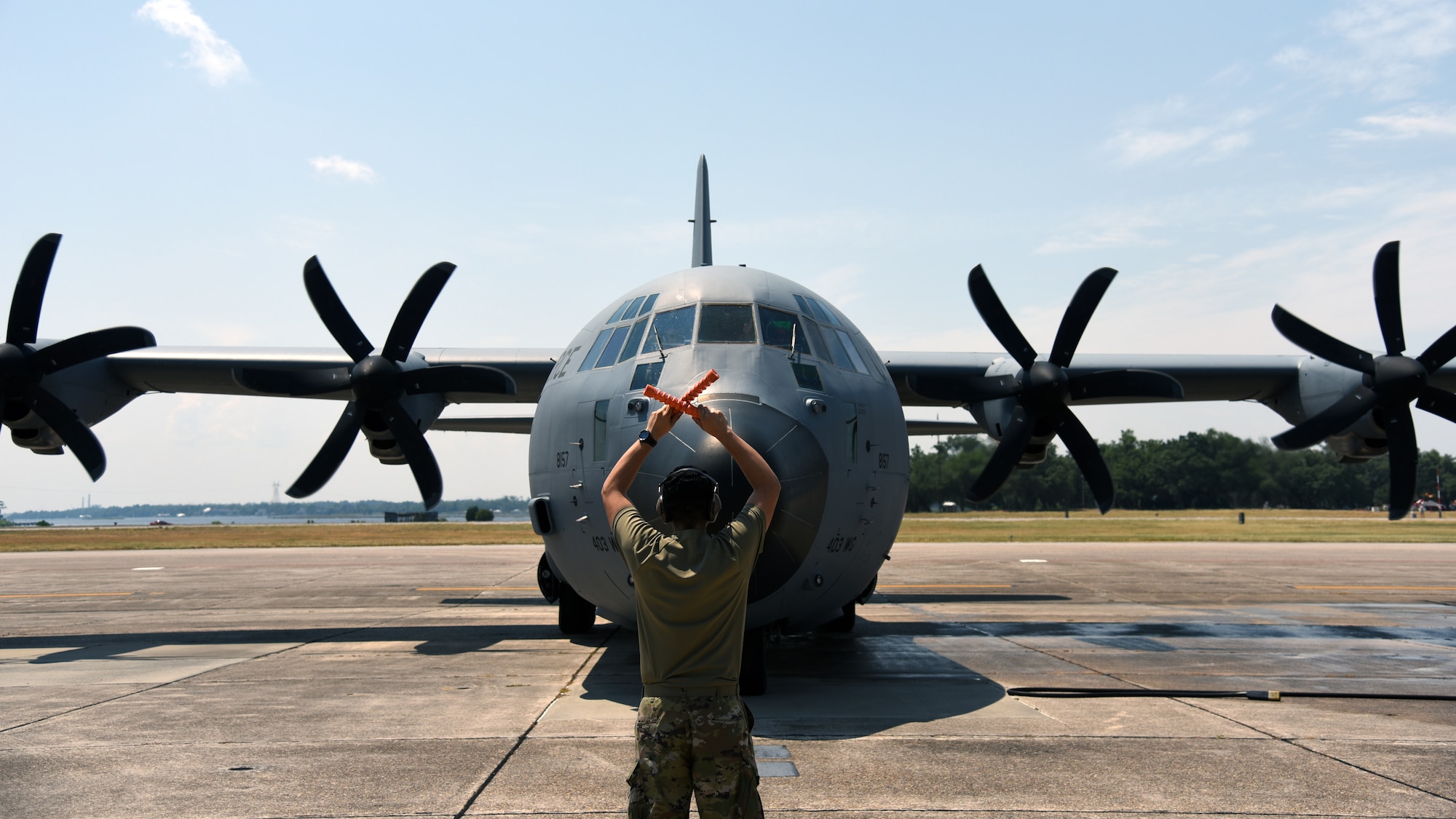 A C-130J Super Hercules from the 815th Airlift Squadron,  taxis into its parking spot June 4, 2019 at Keesler Air Force Base, Miss. Lt. Col. Keith Gibson, 403rd Operations Group deputy commander, flew the lead aircraft of a two ship flight during his final flight with the “Flying Jennies.” (U.S. Air Force photo by Tech. Sgt. Christopher Carranza)