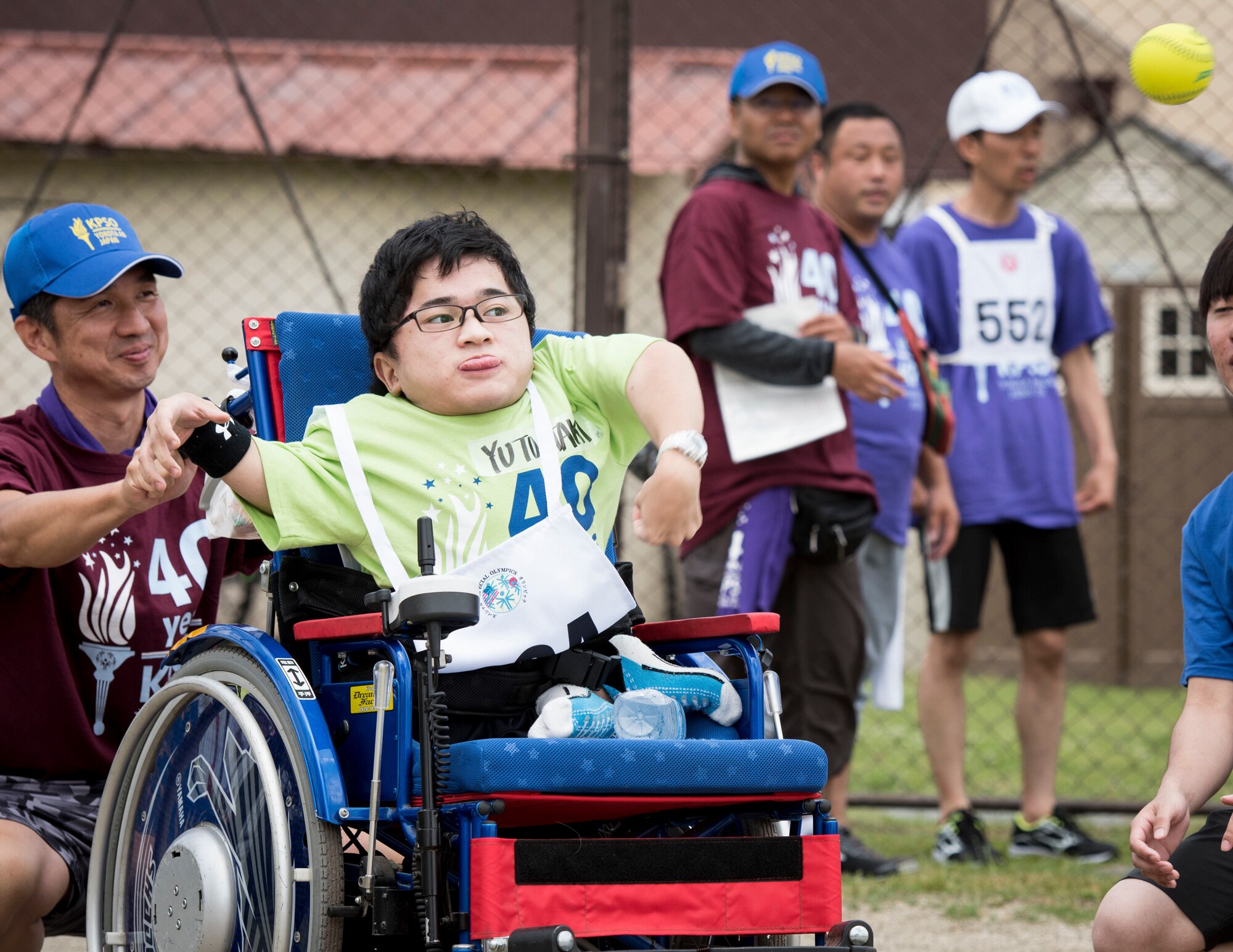 An athlete throws a ball during the softball throw competition of the Kanto Plains Special Olympics at Yokota Air Base, Japan, June 1, 2019.