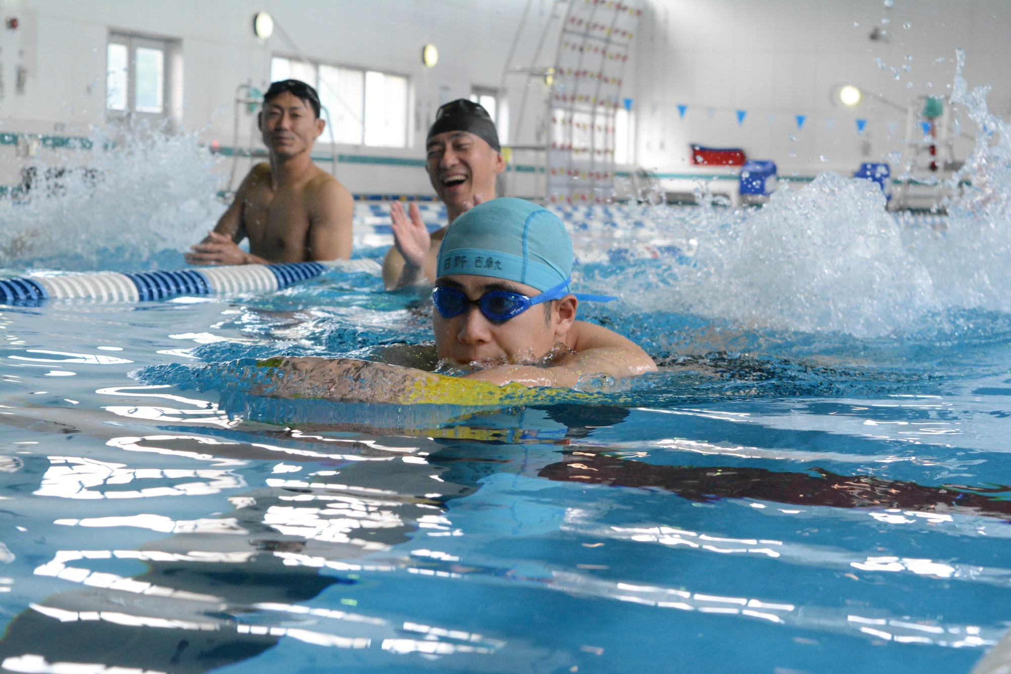 An athlete nears the finish line during the swimming competition of the Kanto Plains Special Olympics at Yokota Air Base, Japan, June 1, 2019.