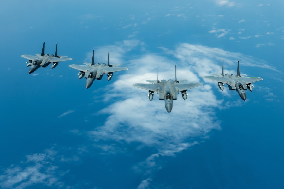 Four F-15C Eagles from the 44th Fighter Squadron fly in formation April 15, 2019, during a routine training exercise out of Kadena Air Base, Japan. The Eagle can be armed with combinations of four different air-to-air weapons: AIM-7F/M Sparrow missiles or AIM-120 AMRAAM advanced medium-range air-to-air missiles on its lower fuselage corners, AIM-9L/M Sidewinder or AIM-120 AMRAAM missiles on two pylons under the wings, and an internal 20 millimeter (0.79 in) M61 Vulcan Gatling gun in the right wing root. (U.S. Air Force photo by Airman 1st Class Matthew Seefeldt)