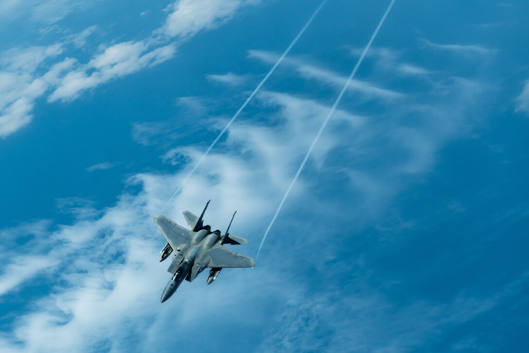 An F-15C Eagle from the 44th Fighter Squadron flies during a routine training exercise April 15, 2019, out of Kadena Air Base, Japan. The Eagle can be armed with combinations of four different air-to-air weapons: AIM-7F/M Sparrow missiles or AIM-120 AMRAAM advanced medium-range air-to-air missiles on its lower fuselage corners, AIM-9L/M Sidewinder or AIM-120 AMRAAM missiles on two pylons under the wings, and an internal 20 millimeter (0.79 in) M61 Vulcan Gatling gun in the right wing root. (U.S. Air Force photo by Airman 1st Class Matthew Seefeldt)
