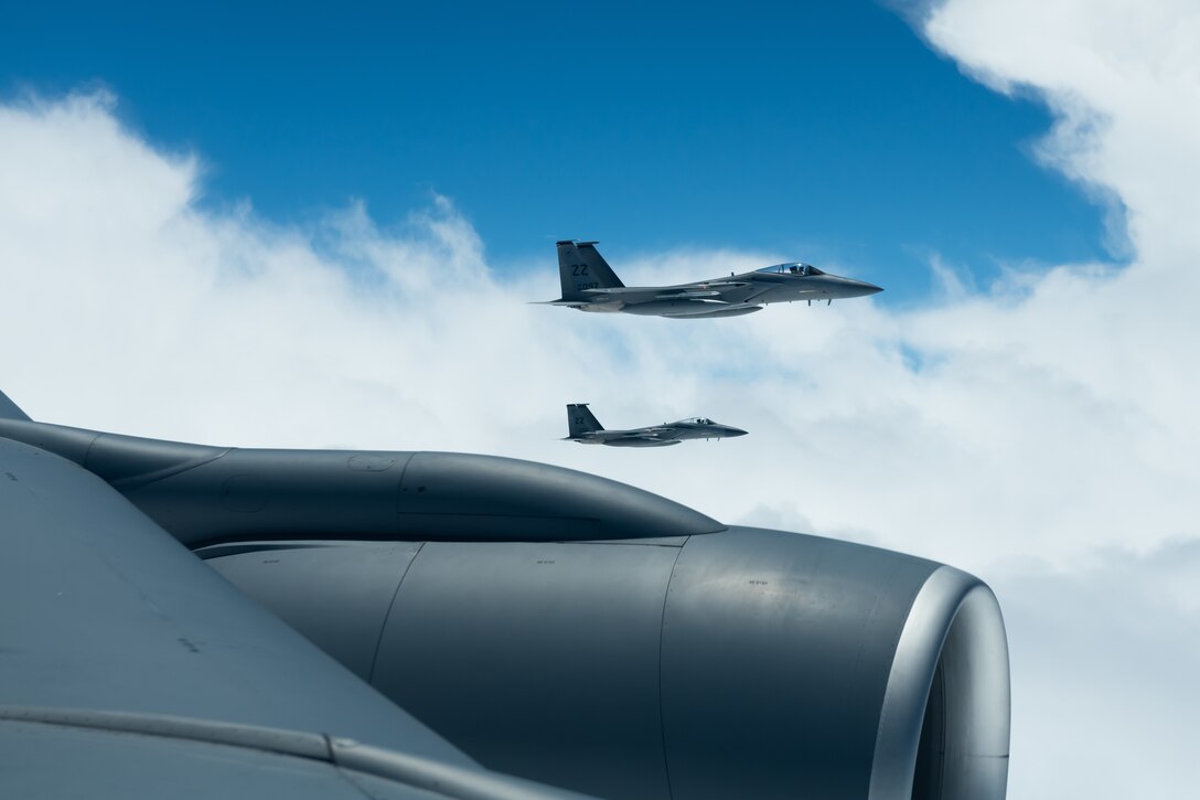 Two F-15C Eagles from the 44th Fighter Squadron fly in formation April 15, 2019, during a routine training exercise out of Kadena Air Base, Japan. The F-15 Eagle is an all-weather, maneuverable, tactical fighter designed to permit the Air Force to gain and maintain air supremacy over the battlefield. (U.S. Air Force photo by Airman 1st Class Matthew Seefeldt)